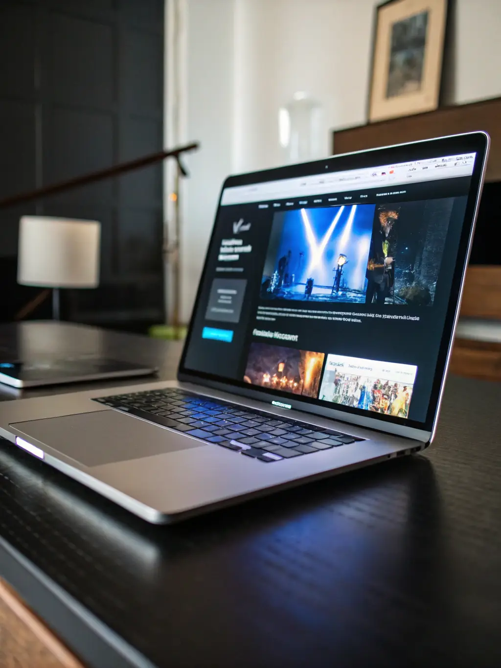 A clean, modern business card website design featuring a prominent logo and clear contact information, displayed on a laptop screen.